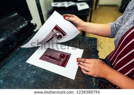 linocut. printing on the machine