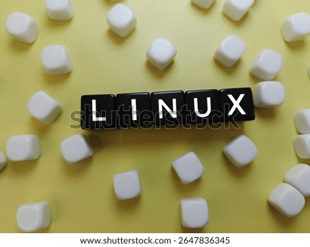 Linux on black dice surrounded by many white dice — symbolizing uniqueness, open-source freedom, tech individuality, software alternatives, and non-mainstream operating system choices. 