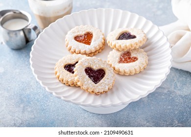 Linzer cookies with jam filling and heart shapes for Valentine