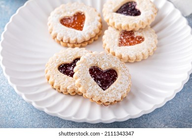 Linzer Cookies With Jam Filling And Heart Shapes For Valentine