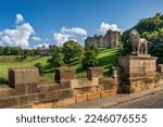 The Lion Bridge over the River Aln in Northumberland, with Alnwick Castle in the background. 