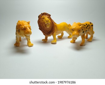 Lion, Cheetah And Tiger Plastic Toy - Miniature Plastic Toy Animals On White Background