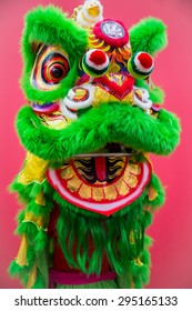 Lion Dance Isolated In A Pink Background