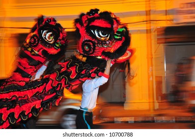 Lion Dance At Night, Taken With Low Shutter Speed, Panning And Fill Flash