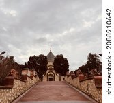 Lion road and magnificent sky stretching towards Zsolnay Mausoleum Pecs Hungary