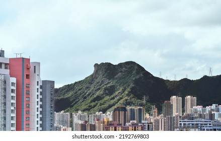  Lion rock mountains with old buildings in HongKong                              