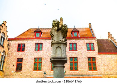 Lion statue in Huidenvettersplein square, Bruges (Brugge), Belgium