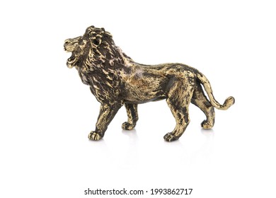Lion Vintage Antique grunge bronze brass figurine statue of beautiful animal, isolated on white background. Decoration Sculpture for interior. Copy Space for Text. Close up Selective soft focus.