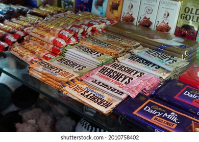 Lion White, Hersheys Chocolates Candy Bar Displayed On A Shelf Inside A Supermarket. Chocolate Sweets For Sale On Supermarket Shelf. Kitkat, Nestle, Dairy Milk Chocolate. - Goa India - May 2021