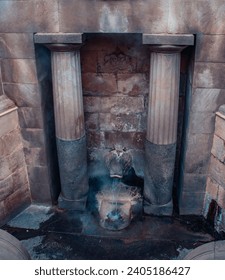 Lion's fountain with thermal water in Catalonia, Spain. Caldes de Montbui Barcelona Province. Old fountain 