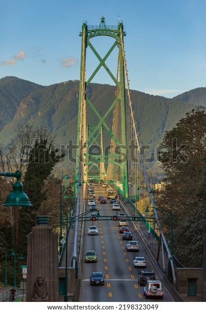 Lions Gate Bridge with traffic in Vancouver\
Canada, View from Stanley Park. Built in the 1930s, Vancouver\'s\
Lions Gate Bridge spans across Burrard Inlet to the\
Northshore-September\
3,2022
