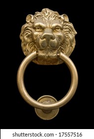 Lion's head door knocker isolated on black