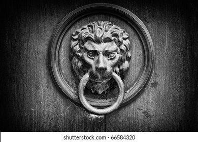 The lion's head as a doorknocker black and white