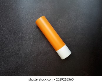 A Lip Balm Isolated On Black Background