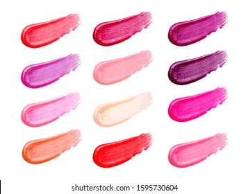 Lip gloss face make-up samples palette. Set of colorful cosmetic liquid lipgloss in different colour smudge smear strokes. Make up smears isolated on a white background. Lipstick colors