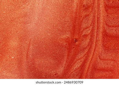 Lip gloss orange red colored shimmering wave textured background - Powered by Shutterstock