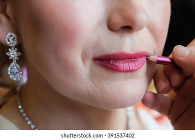 Lip Makeup For Elderly Woman. Makeup For Older Women. The Color Of The Lips Lipstick. Beautiful Old Woman Applying Lipstick. Makeup To Plump Lips. Cosmetics For The Mouth. 