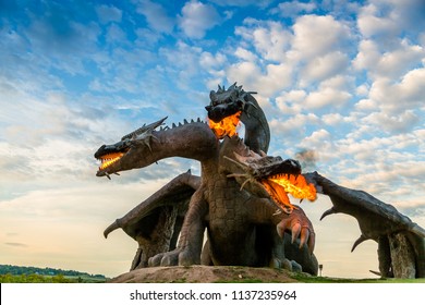 Lipetsk region, Eletz, Russia 2018: Dragon. Huge sculpture of three-headed dragon. Safari park. Ethno folk festival at Kudykina Mountain. 