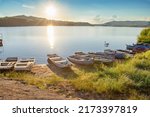 Lipno reservoir - largest water area in Czech republic. Lipno in village Horni Plana, beautiful sunset, clean water, boats. Amazing South Bohemia nature. 