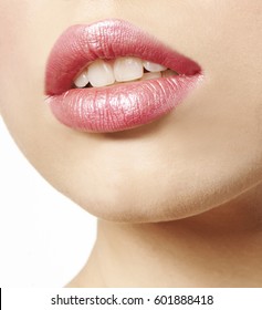 Lips Close Up With Pink Metallic Lipstick