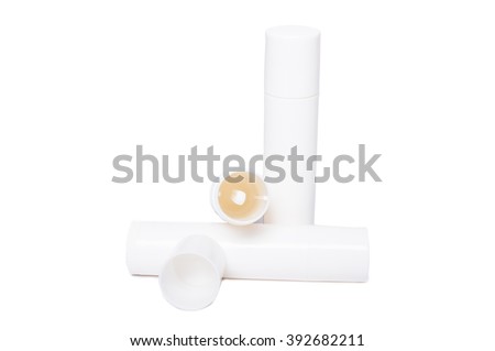 Lips moisturizer white plastic containers isolated. Blank copy space as advertsing area