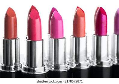 Lipstick. Fashion Colorful Lipsticks isolated on white background. Lipstick tints palette, Professional Makeup and Beauty. Beautiful Make-up concept. Lipgloss. Lipsticks closeup