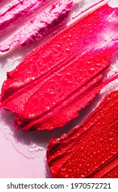 Lipstick Or Lip Gloss Swatch Macro Wallpaper. Beauty Swash Texture. Liquid Makeup Product Closeup. Cosmetic Smears Isolated On Pink Background. Horizontal Banner Template With Copy Space