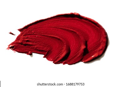 Lipstick Or Lipgloss Swatch Smudge Smear Isolated On White Background. Wavy Cream Makeup Texture. Red Color Cosmetic Product Brush Stroke Swipe Sample.