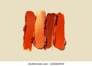 Lipstick Pink Red Orange Brown Palette Smudge Background Texture Isolated On Vanilla Yellow Background