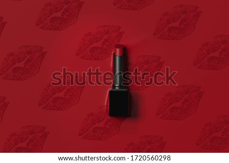 Lipstick placed in ribbon around red