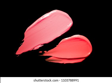Lipstick smudge isolated black background