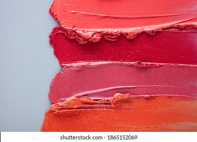 Lipstick Smudge Swatch On Blue Gray Colored Background