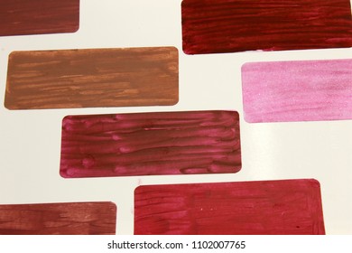 Lipstick swatches on a White background - Shutterstock ID 1102007765