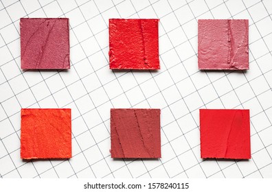 Lipstick swatches on white square background