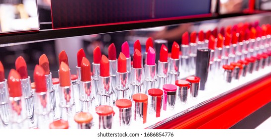 Lipstick testers in shop window  Assortment different colors  Panorama format 