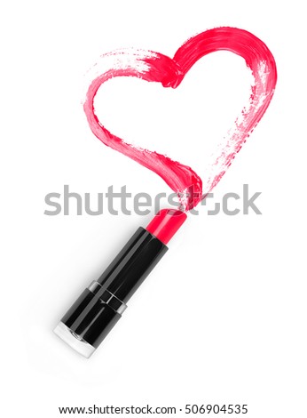 Lipstick and a trace in the form of heart closeup isolated on white background 