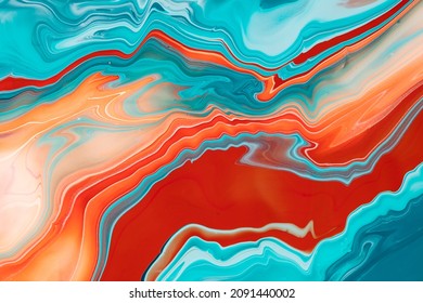 Liquid acrylic background of overflowing paint mix. Fluid art texture of colorful waves and whirling shapes. An abstract mix of fluent dyes that flows up and down and creates a rippled backdrop.