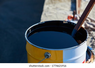 Liquid Black Bitumen In A Metal Barrel