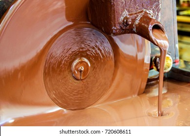 liquid chocolate in a chocolate artisan shop - Powered by Shutterstock