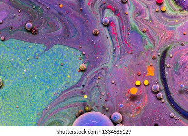 Liquid colorful paint background. Creative background with abstract watercolor painted waves handmade surface. Close up of different watercolor paint. concept colorful space.