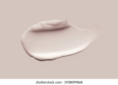 Liquid cream cosmetic smudge texture gray beige background