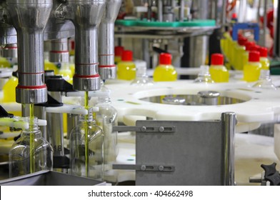 Liquid Detergent On Automated Production Line. Machinery For Bottling