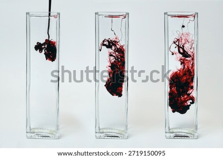 Liquid Diffusion Process with Red Dye Mixing in Water – Three Stage Sequence
