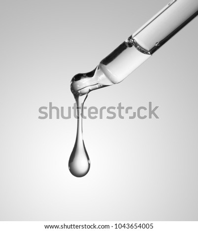 Liquid drop from laboratory glass Pipette