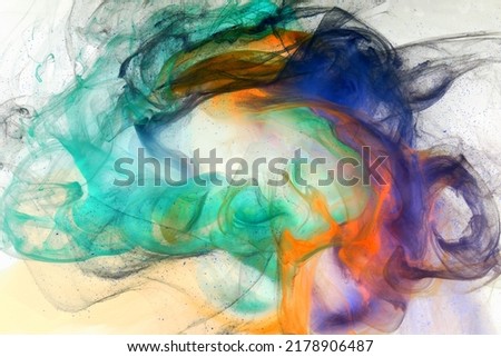 Liquid fluid art abstract background. Mix of dancing acrylic paints underwater
