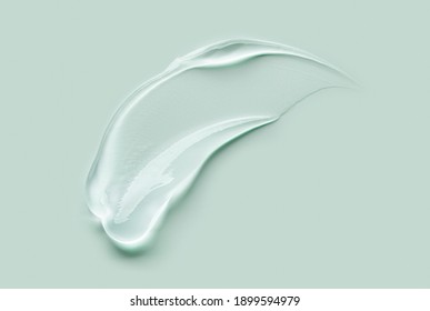 Liquid gel cosmetic smudge drops texture green grey background  - Shutterstock ID 1899594979