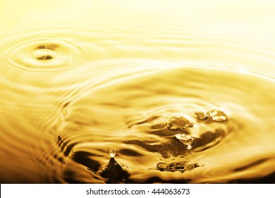 Liquid Gold Drop And Ripple ,abstract Background