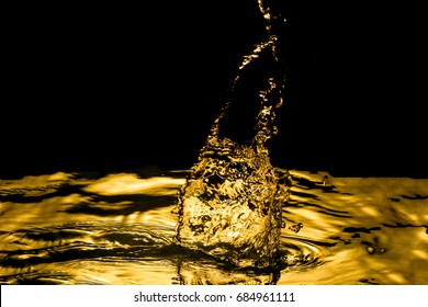 Liquid Gold Drop And Ripple ,abstract Background