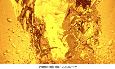 Liquid Golden Oil Texture, Abstract Background. Whisky, Rum, Cognac, Tea Or Oil Texture.