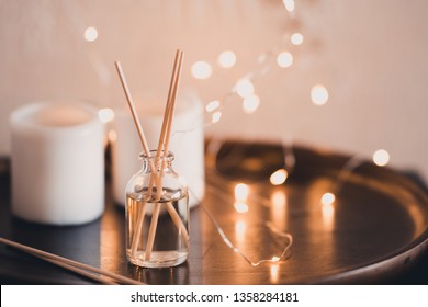 Liquid Home Fragrance In Aroma Sticks With Glass Bottle Closeup. 